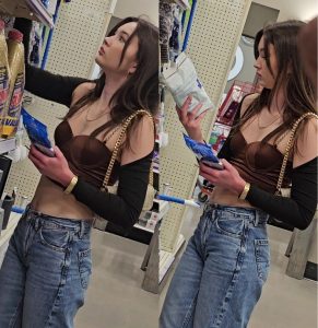 Cute Brunette in a Store